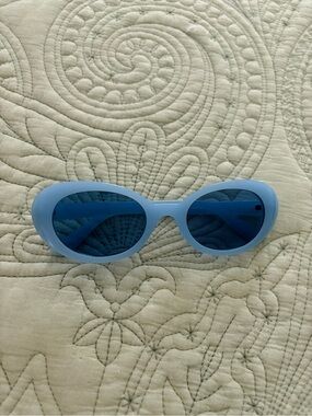 Urban Outfitters Sky Blue Oval Sunglasses with Blue Lenses